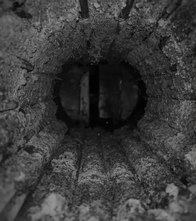 Before Chimney Cleaning - Soot and Debris in Flue