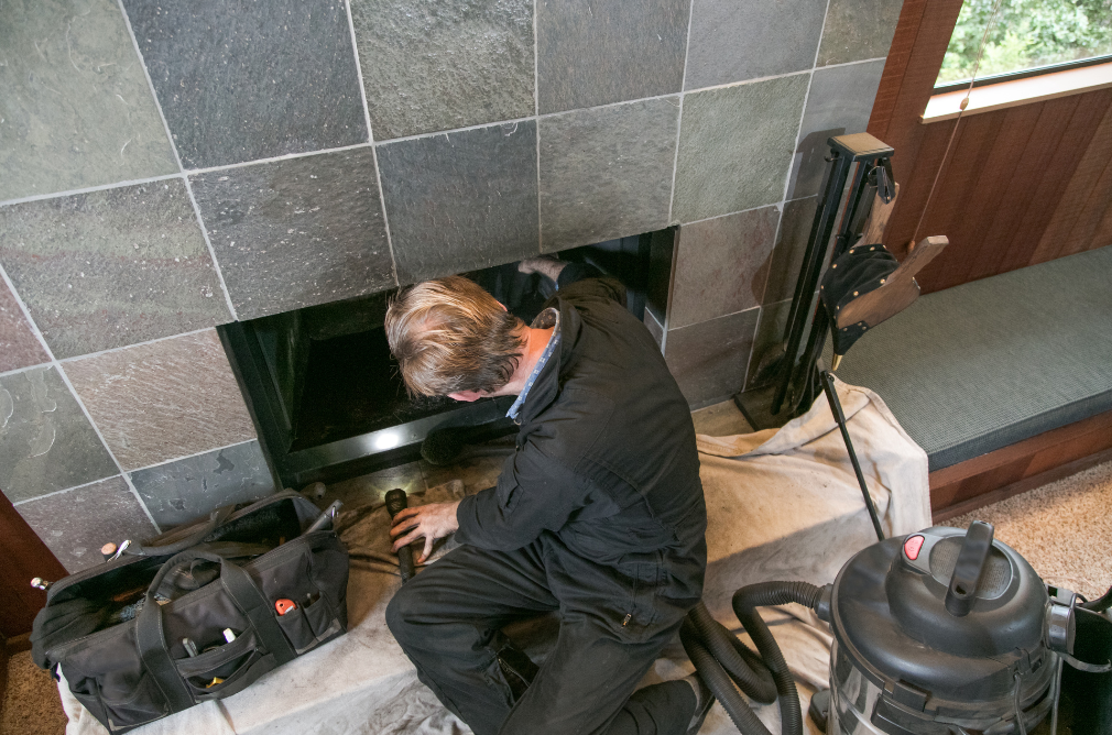 Indoor fireplace chimney sweeping service